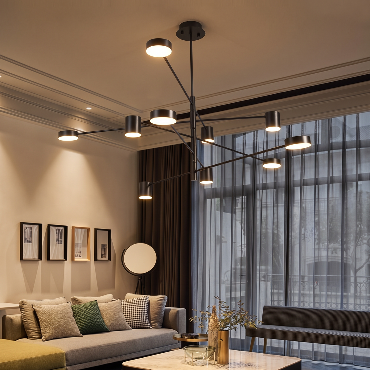 Vega six-arm chandelier in matt black over a living room