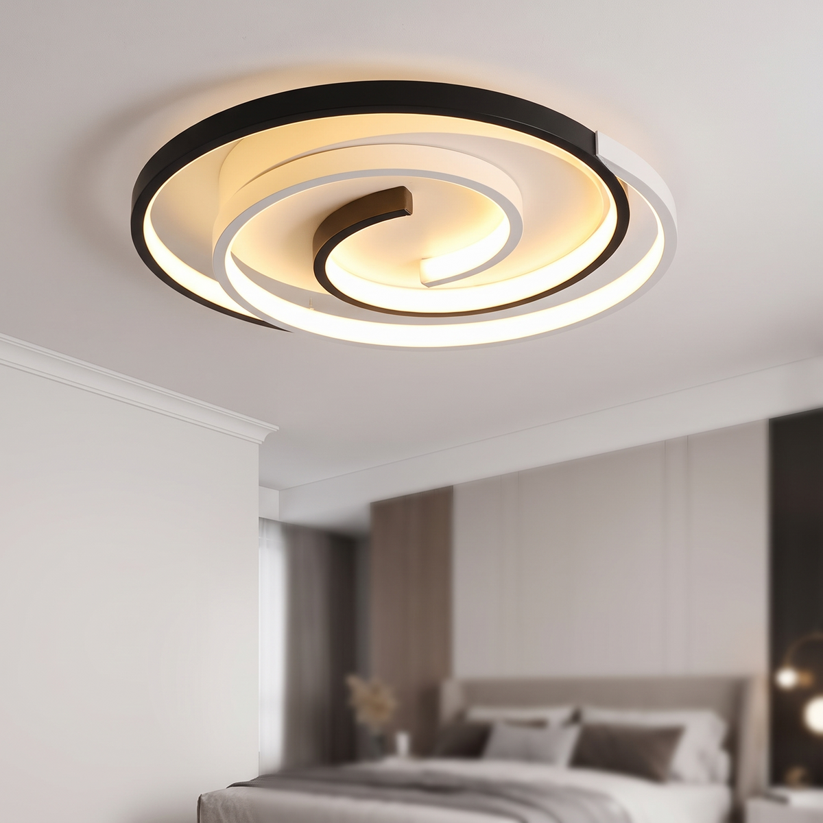 Swirl ceiling light seen at a low angle, sitting flush to the plaster