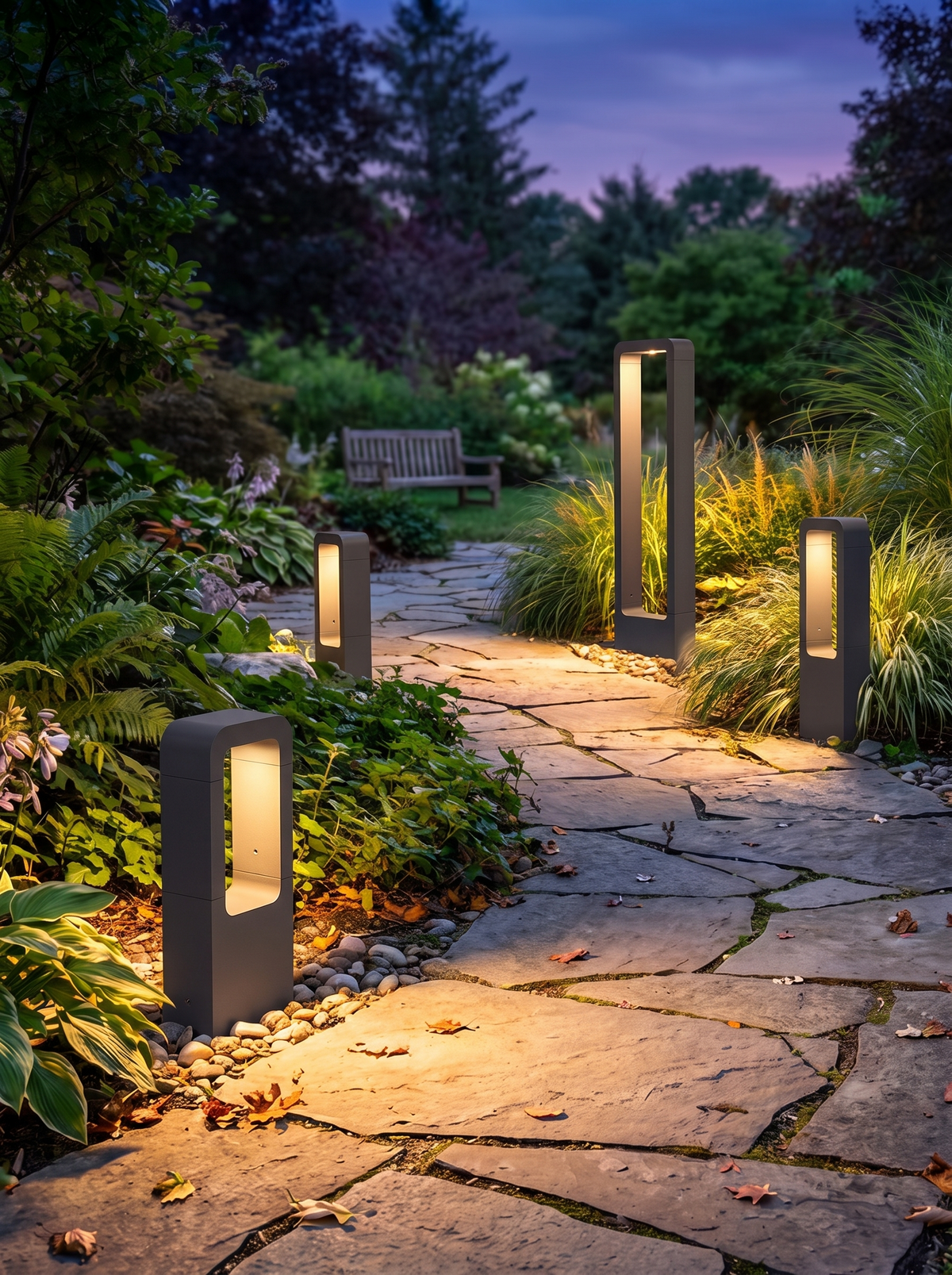 GardenGlow bollards of differing heights among planting