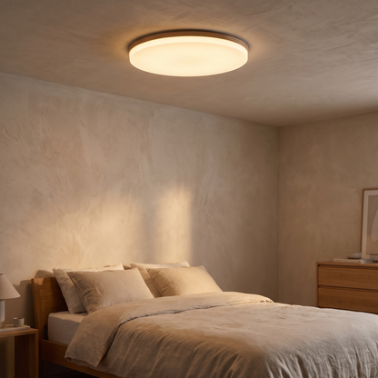 Washi slim disc ceiling light fitted close to a bedroom ceiling