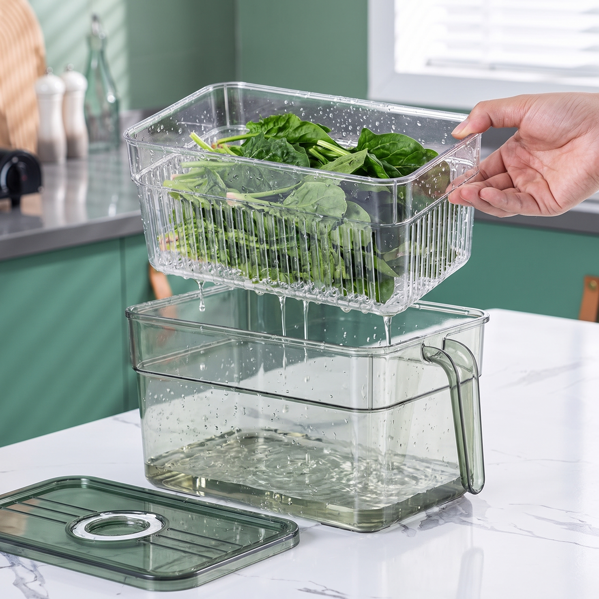 Crisper fridge storage box with the draining tray lifted out