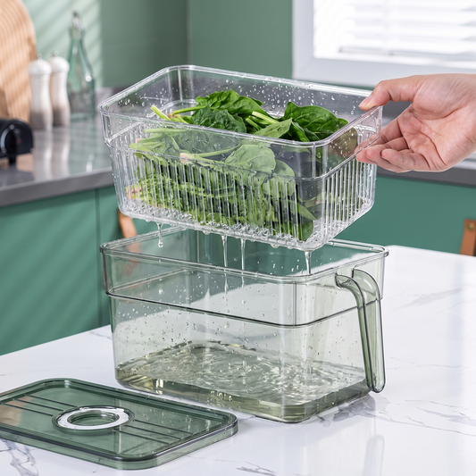 Crisper fridge storage box with the draining tray lifted out